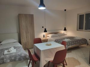 Postel nebo postele na pokoji v ubytování Batkoski Apartments