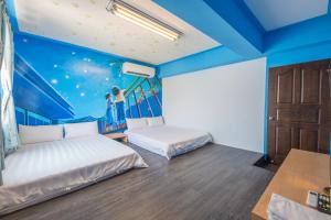 Postel nebo postele na pokoji v ubytování Liouciou Good Homestay