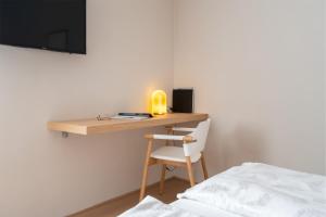 Postel nebo postele na pokoji v ubytování Hotel Al Maso