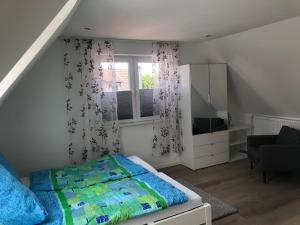 Postel nebo postele na pokoji v ubytování Seeperle
