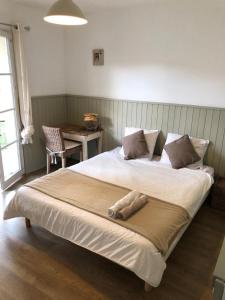 Postel nebo postele na pokoji v ubytování Villa Taru Marais Poitevin