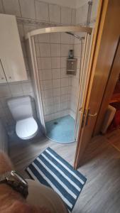 Koupelna v ubytování Casa Tipica Arbedese