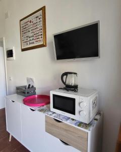 A kitchen or kitchenette at Appartamenti Vanacore