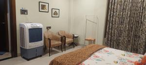 Fotografie z fotogalerie ubytování Riverside Palm Deluxe Double Room with AC in a house near Kamakhya and IHR v destinaci Guváhátí