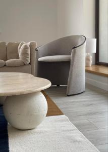 a living room with a table and a couch at Blisko me in Wieprz