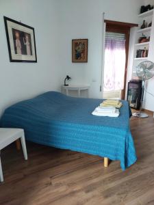 Un pat sau paturi într-o cameră la A Casa di Vale