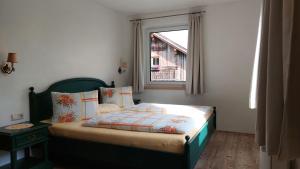Postel nebo postele na pokoji v ubytování Haus Ellbrunn