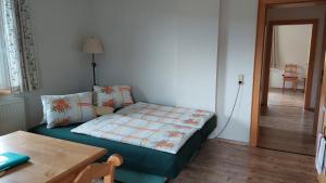 Postel nebo postele na pokoji v ubytování Haus Ellbrunn