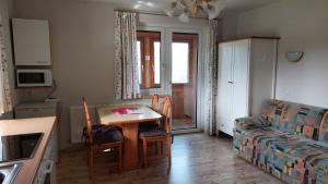 Kuchyň nebo kuchyňský kout v ubytování Haus Ellbrunn
