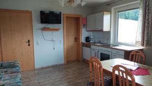 Kuchyň nebo kuchyňský kout v ubytování Haus Ellbrunn