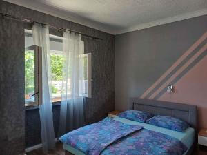 Postel nebo postele na pokoji v ubytování Apartment in Supetarska Draga 17854