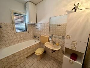 Koupelna v ubytování APARTMAN NENO