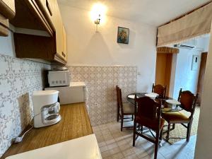 Kuchyň nebo kuchyňský kout v ubytování APARTMAN NENO + 16 fotografií
