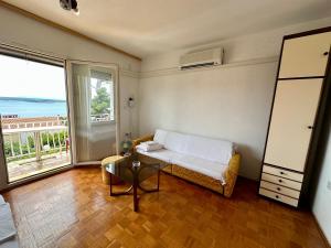 Postel nebo postele na pokoji v ubytování APARTMAN NENO