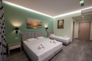 Postel nebo postele na pokoji v ubytování Franklin Rooms