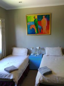 Postel nebo postele na pokoji v ubytování Hilton View B&B