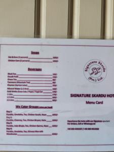 Un certificado, premio, letrero u otro documento en Signature Skardu Hotel