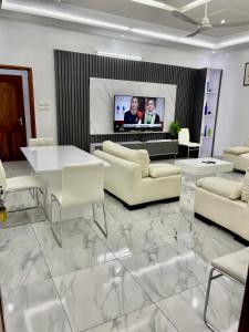 TV a/nebo společenská místnost v ubytování Guidi