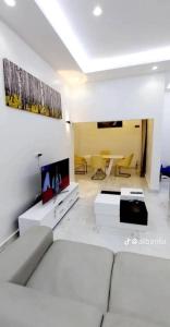 TV a/nebo společenská místnost v ubytování Guidi