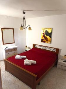 A bed or beds in a room at casa nina