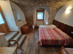 Postel nebo postele na pokoji v ubytování B&B La Presef