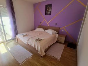 Postel nebo postele na pokoji v ubytování Villa Rab Robert