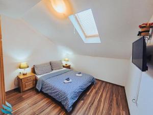 Postel nebo postele na pokoji v ubytování Hvar apartmani & spa