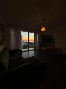 Posezení v ubytování Andrra Apartment - Talea Coast