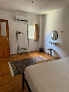 A bed or beds in a room at Held Hotel