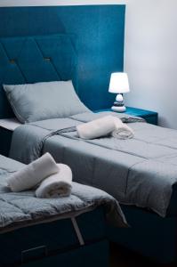 A bed or beds in a room at Radović Apartman Még 8 kép