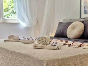Posteľ alebo postele v izbe v ubytovaní Elite Residence Flos