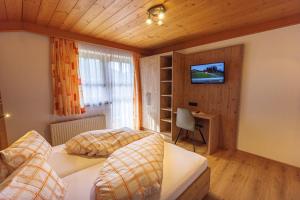Postel nebo postele na pokoji v ubytování Ferienhaus Grubhof