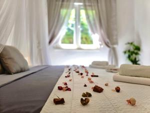 Posteľ alebo postele v izbe v ubytovaní Elite Residence Flos