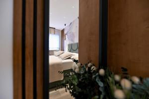 Posteľ alebo postele v izbe v ubytovaní Apartments and Rooms Nekic
