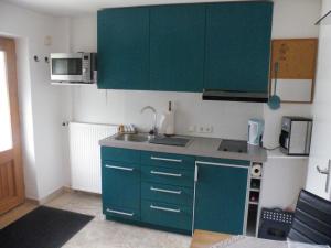 Kuchyň nebo kuchyňský kout v ubytování Apartment Bernd