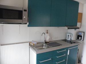 Kuchyň nebo kuchyňský kout v ubytování Apartment Bernd
