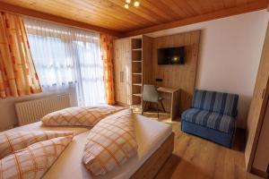 Postel nebo postele na pokoji v ubytování Ferienhaus Grubhof
