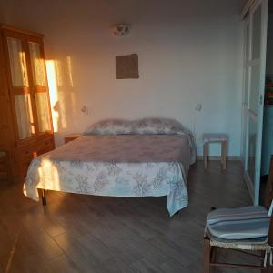Postel nebo postele na pokoji v ubytování Torre La Mezzaluna