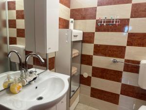 Koupelna v ubytování Apartments Zupan
