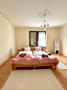 a bedroom with a large bed in a room at Forest Charm and Gems in Idar-Oberstein +7 photos