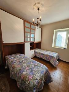 Katil atau katil-katil dalam bilik di Casa dei Ciliegi +18 gambar