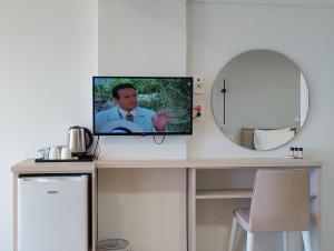 Televiisor ja/või meelelahutuskeskus majutusasutuses Lofos