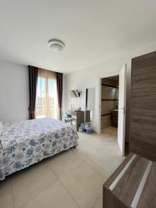 Postel nebo postele na pokoji v ubytování B&B Le Maree