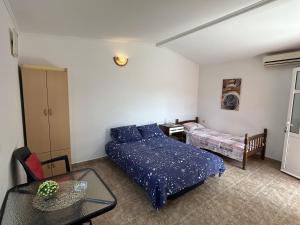 Postel nebo postele na pokoji v ubytování Apartments TODOR