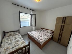 Postel nebo postele na pokoji v ubytování Apartments TODOR