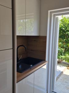 Fotografie z fotogalerie ubytování Apartmani Komin v Pakoštane