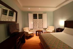 Łóżko lub łóżka w pokoju w obiekcie Gran Hotel Aqualange - Balneario de Alange