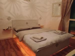 A bed or beds in a room at Studio Sedie Volanti