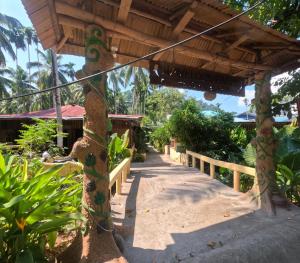 a walkway at a resort in the philippines at Havelock Farms Resort in Havelock Island