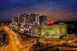 a city at night with buildings and street lights at Vivacity jazz suite 3 condo 139 in Kuching